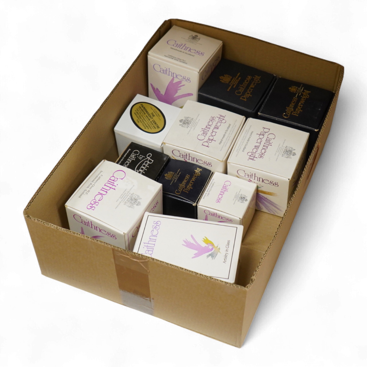 A collection of Caithness glass paperweights